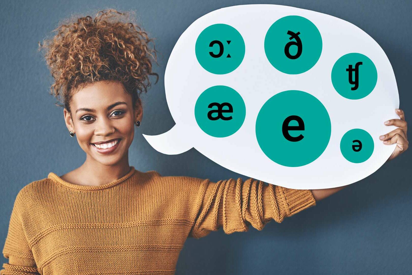 Une femme heureuse avec symboles phonetiques